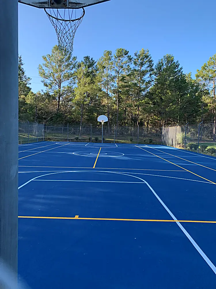 Regulation basketball court with multi-sport striping