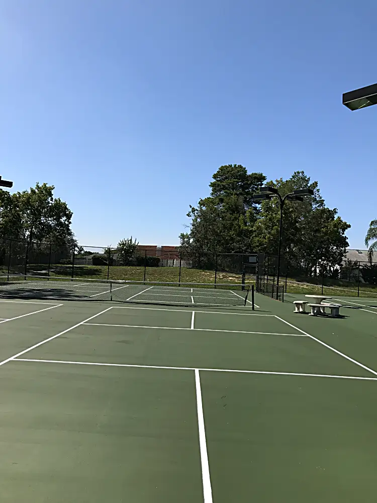 Multiple regulation tennis courts