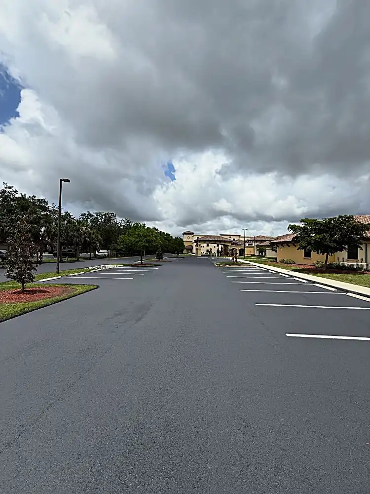 Wide parking lot view with fresh sealcoat
