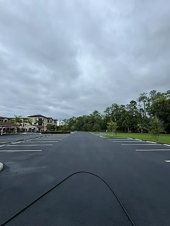 Parking lot with fresh striping and sealcoat