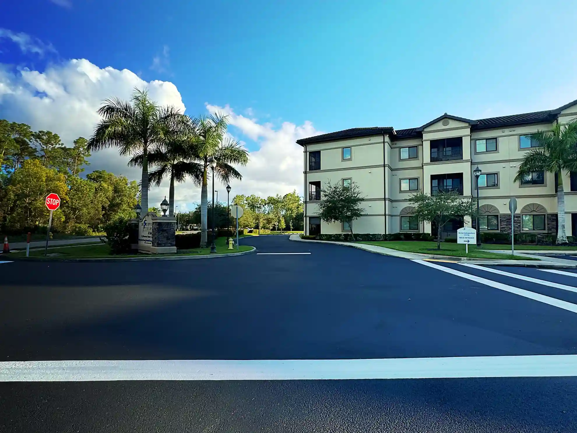 Professional sealcoating services protecting asphalt in Hudson, Florida