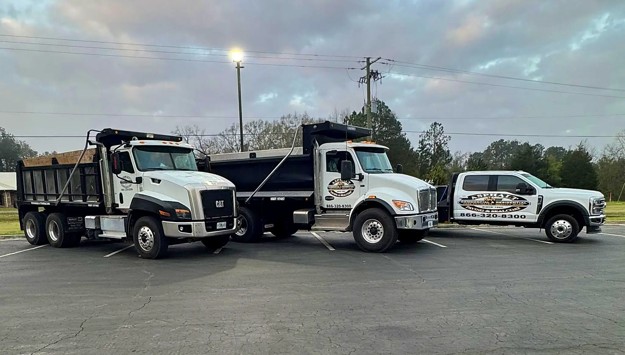 Asphalt Paving and Maintenance company trucks