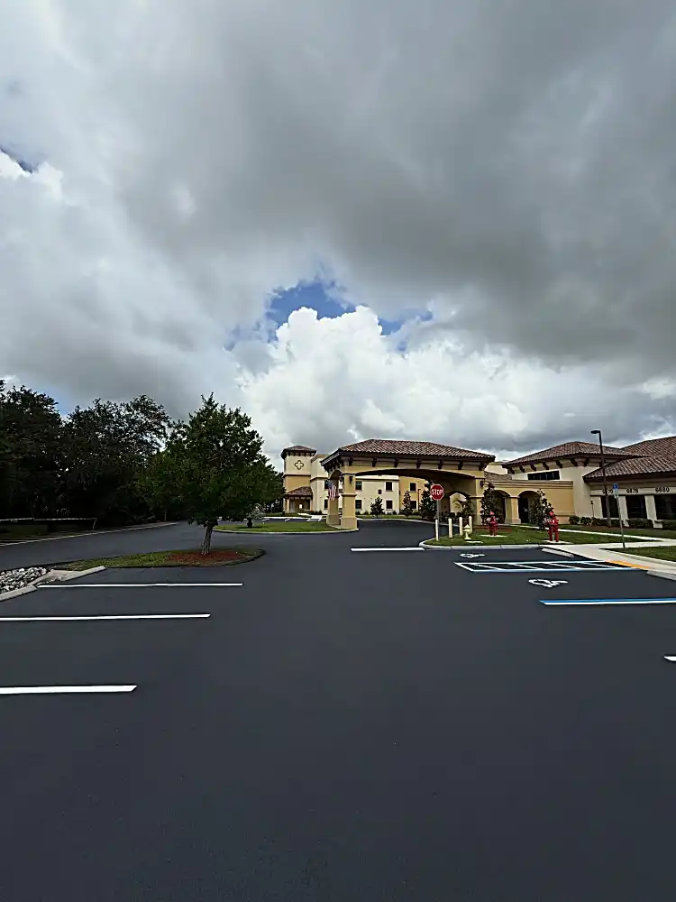 Fort Myers motel entrance with fresh sealcoating and striping