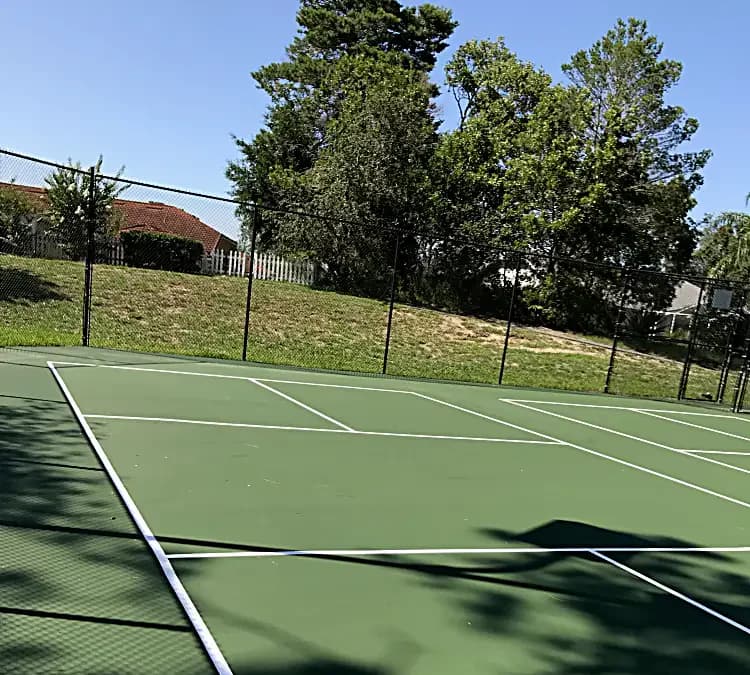 Outdoor recreation court surface with fresh line markings