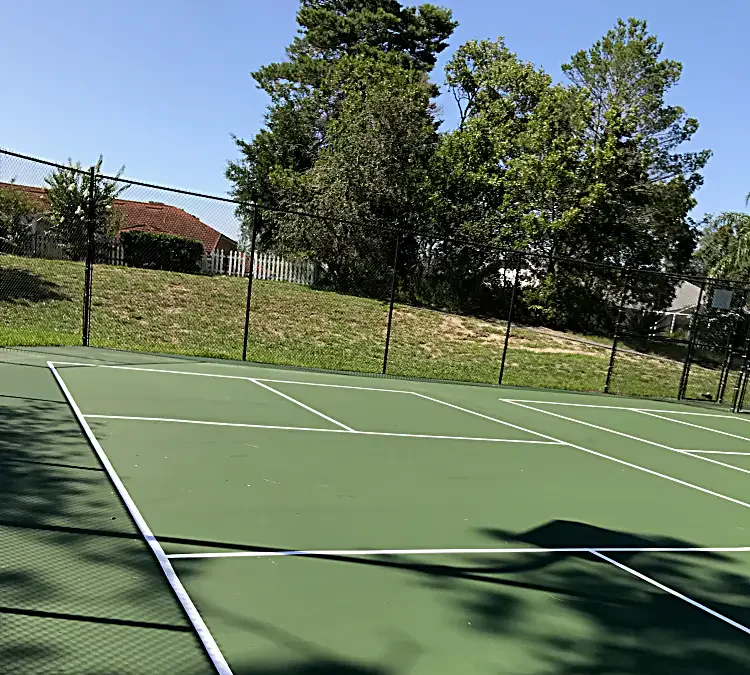 Outdoor recreation court surface with fresh line markings